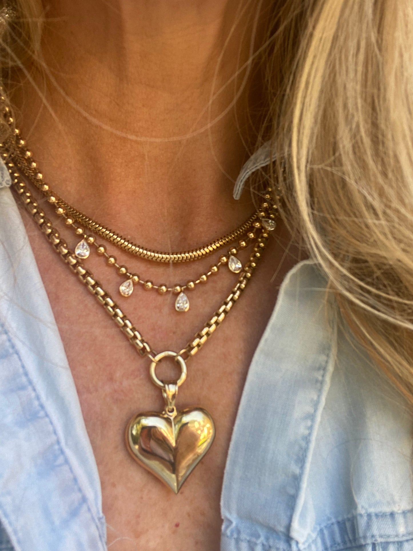Large puffed heart (gold teething heart).