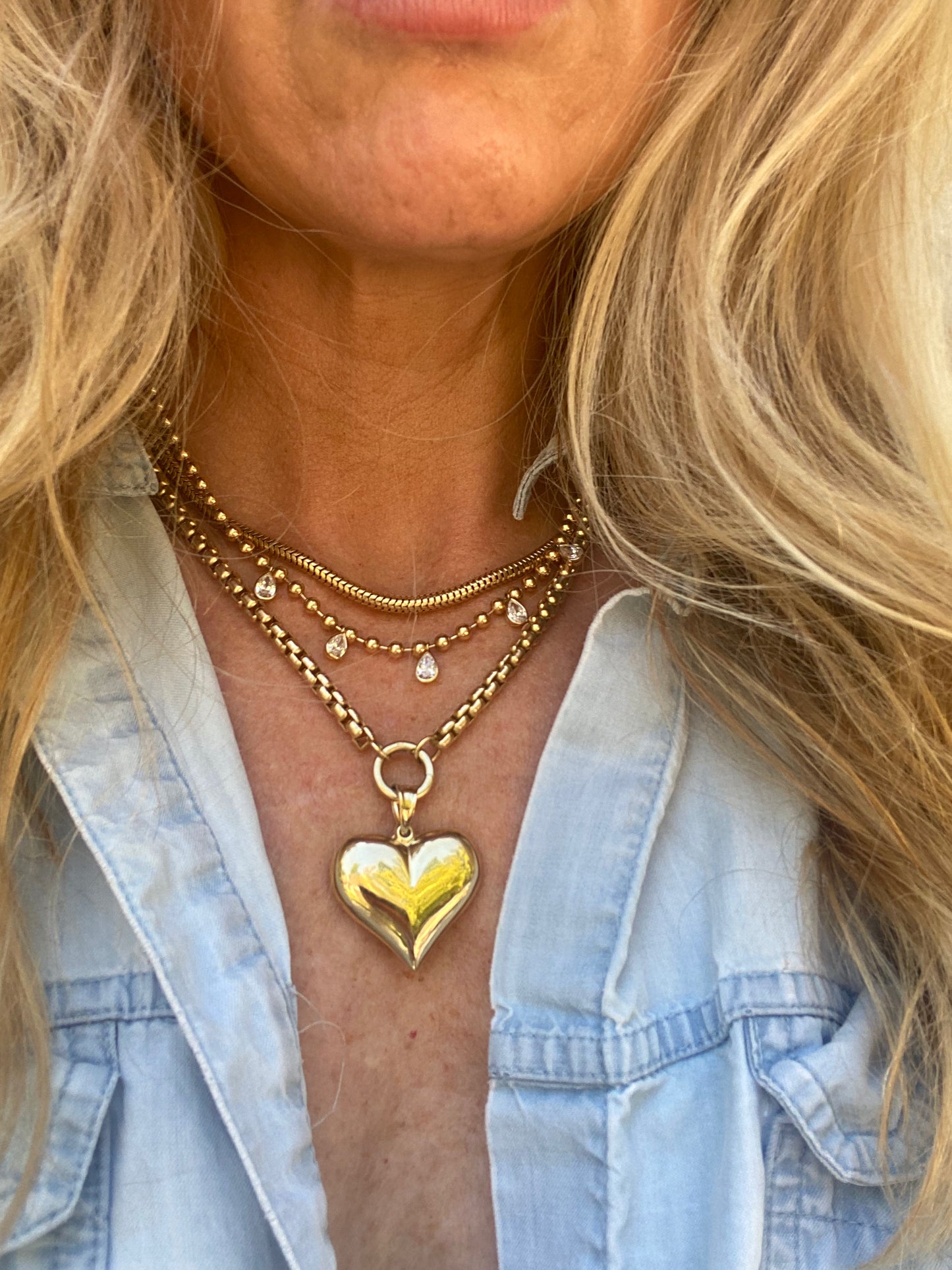 Large puffed heart (gold teething heart).